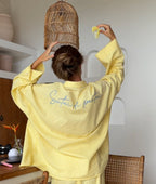 Blouse “Santai di pantai” lemon stripe
